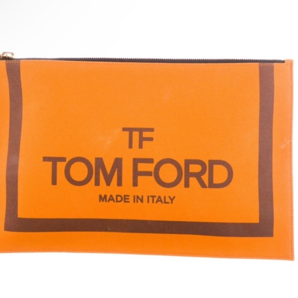 AUTHENTIC TOM FORD CANVAS CLUTCH. ONLY USED ONCE. INCLUDES BOX.